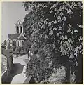 Église Notre-Dame-de-l’Assomption seen from Rue du Montcel, Auvers-sur-Oise, 1951-1952.