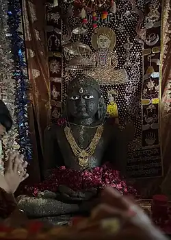 Idol of Rishabhanatha Decorated with Flowers & Ornaments as per Śvetāmbara Rituals