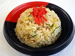 Chahan fried rice on a plate, molded into the shape of a dome.