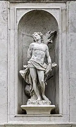 Saint Sebastian on the front of San Stae church in Venice