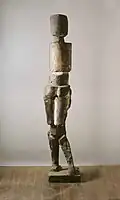 Figure composed of ceramic forms (1961), polychromed plaster, h.142 cm
