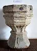 Gothic baptismal font from the church, now in the Sanok Historical Museum