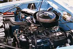 Shows the engine compartment with a "Go Package" 390 CID V8