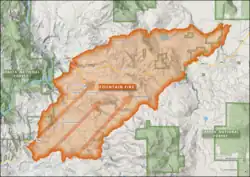 A map of the fire footprint shows it stretching from southwest to northeast on both sides of Highway 299, engulfing both Round Mountain and Montgomery Creek