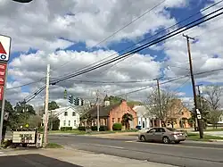 The intersection of De Jean Street and Main Street in Washington