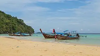 Long-tail boats. Loh Moo Dee Beach, Ko Phi Phi Don