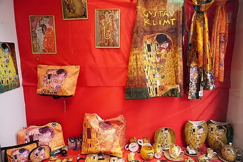 Gustav Klimt's The Kiss printed on various objects in the window of a shop in Salzburg, Austria (2019)