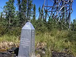The obelisk as seen from the Manitoba (southeast) side, with a survey tower in the territories
