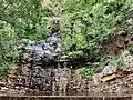 Sonavana waterfalls suitable for bathing near temple complex