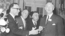 Prof. Robert Stone from Harvard Business School (Associate Director of İstanbu Üniversitesi İşletme İktisadı Enstitüsü), Dr. Nejat Eczacıbaşı, Prof. Dr. Ömer Celal Sarç (Istanbul University), and Thomas Carrol (Ford Foundation) in Lisbon, April 1959.