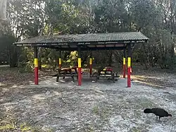 Picnic area near beach featuring Bundjalung words, 2024