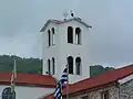 A stork on the top of the church of St. Procopius in Kladorrachi
