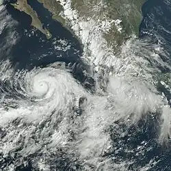 A photograph of Hurricane Adrian and Tropical Storm Beatriz off the Pacific coast of Mexico on June 29, 2023.