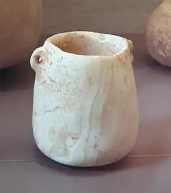 Alabaster pot with handles, Buqras region, 6500 BC Louvre Museum AO 28519
