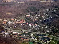 Aerial view of Alfred village, taken April 2006. Alfred State College is near the bottom of the photo, and at the upper-middle is Alfred University.