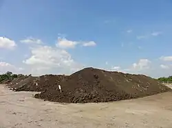 Image 39Alignment of several compost piles on a composting facility in France (from Garden design)