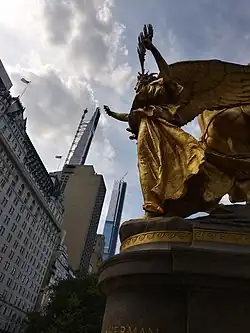 The goddess Nike on the Sherman Monument reaching toward Central Park South, August 2020