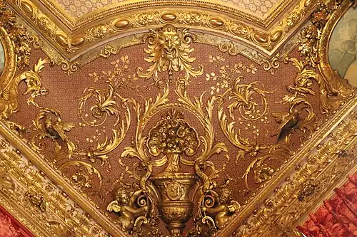 Second Empire style ceiling with a Green Man in the Napoleon III Apartments, in the Louvre Palace, Paris, designed by Hector Lefuel and decorated with paintings by Charles Raphaël Maréchal, 1859-1860[7]