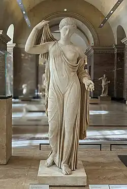 Statue of Aphrodite with short hair and light drapery