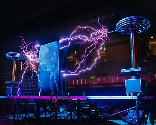 A musical Tesla coil performance takes place at Open Sauce