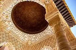 Inside one of the pavilions, with view of the wooden dome