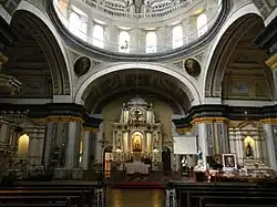 From the aisle, a nearer view of the main altar