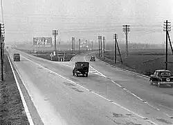Image 32The Italian Autostrada dei Laghi ("Lakes Motorway" in the 1950s; now parts of the Autostrada A8 and the Autostrada A9), the first controlled-access highway ever built in the world (from Road transport)