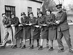 Members of the UK's Auxiliary Territorial Service take part in a rollerskating lesson, 1940.