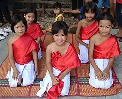 Thai children wearing a pha nung and a pha biang
