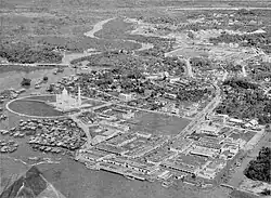Kampong Sultan Lama (left) and the city centre in c. 1960