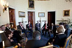 President Barack Obama in a meeting in the Blue Room, 2009
