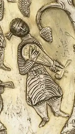 Sasanian plate with celebration, includes lute player