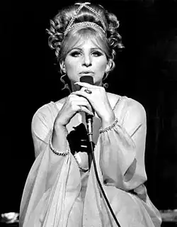 Black-and-white photo of Barbra Streisand singing