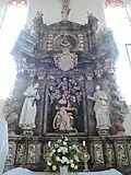 Coat of arms on the altar in the Church of Saint Peter of Alcántara