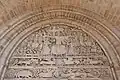 The return and triumph of Christ, depicted on the southern portal tympanum of the St Pierre abbey church.