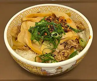 With menma and chili oil