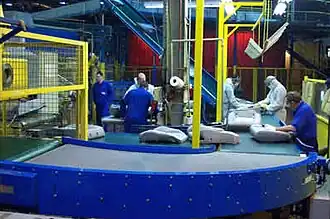 Belt conveyor systems at a packing depot
