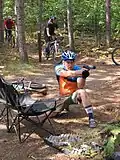 Bike biathlon competition using handguns