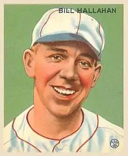A baseball-card image of a smiling man in a white baseball uniform and cap