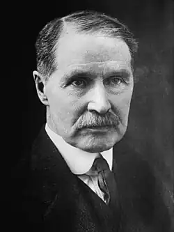 Black-and-white head shot of Law