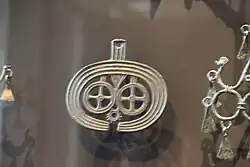 Bronze ornament, Piliny culture, 13th century BC.[2]