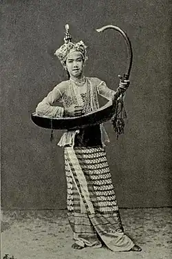 An 1894 photo depicting a Burmese maiden with the saung