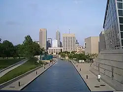 Skyline of downtown Indianapolis from the canal with the Medal of Honor Memorial and Indiana State Museum on the sides