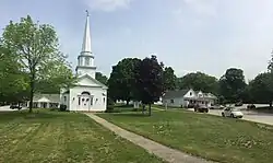 Town center: Canterbury United Community Church (L) & Country Store (R)