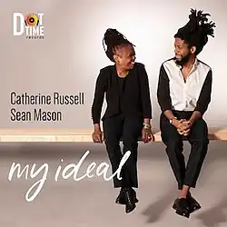 The cover art of My Ideal by Catherine Russell and Sean Mason, showing a photograph of the two artists sat next to each other.