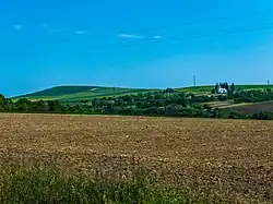 Certieni viewed from the DJ155I road