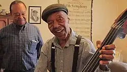 Burrell (center) with son Chuck in 2017