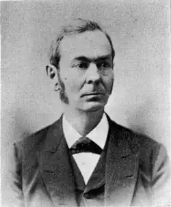 A black and white portrait photograph of Charles Horton Peck