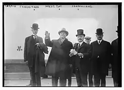 Williams (right) with President William Howard Taft (middle) and Secretary of Commerce Charles Nagel (left) on Ellis Island in 1910.