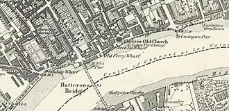 Map showing a riverside road and bridges
